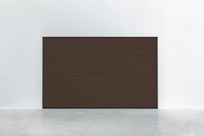 Garagentor Stucco Colore RAL 8014 Sepiabraun – Frontansicht mit dekorativer Oberfläche und moderner Linienführung