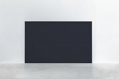 Garagentor Stucco Colore Tiefschwarz – Modernes Garagentor mit dekorativer Stucco-Oberfläche, ideal für jedes Zuhause, hohe Isolierung und Sicherheit.