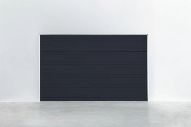 Garagentor Stucco Colore Tiefschwarz – Modernes Garagentor mit dekorativer Stucco-Oberfläche, ideal für jedes Zuhause, hohe Isolierung und Sicherheit.